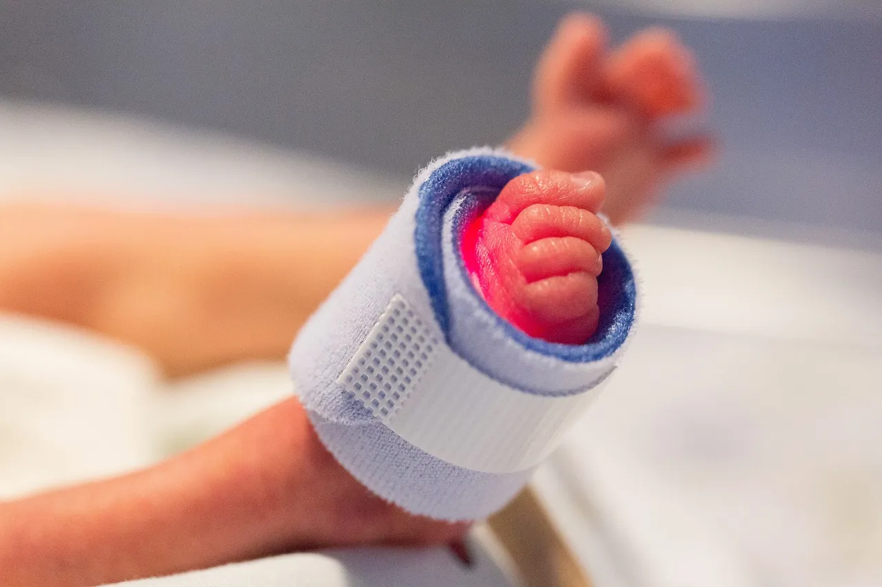 A preterm baby's foot with a pulse oximeter attached